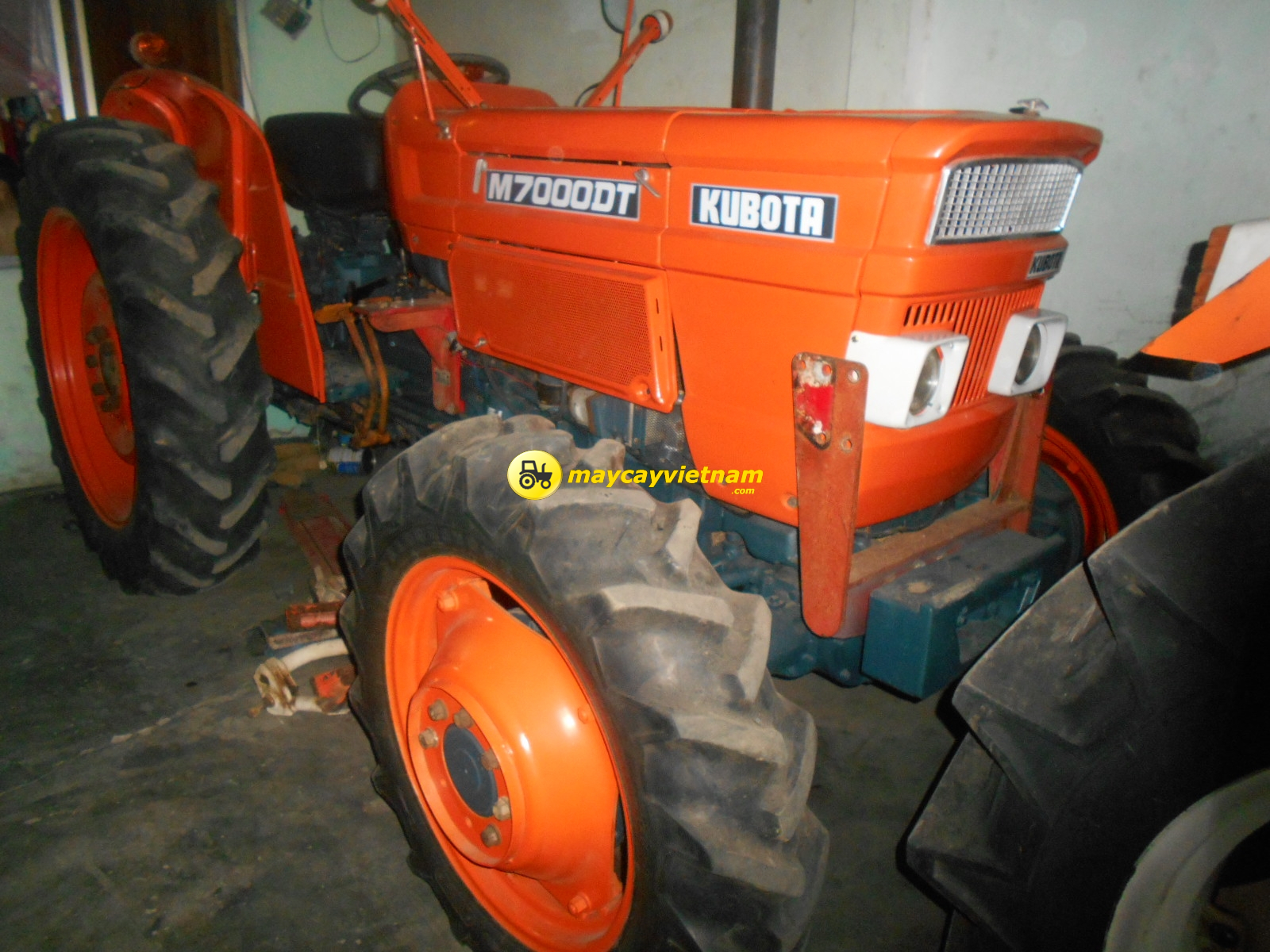 May Cay Kubota M7000-DT